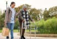 Nurse, support and walker with old woman in park for helping, person with a disability and retirement. Elderly care, nursing and rehabilitation with caregiver and patient in nature for healthcare