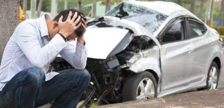 person upset at scene of car accident