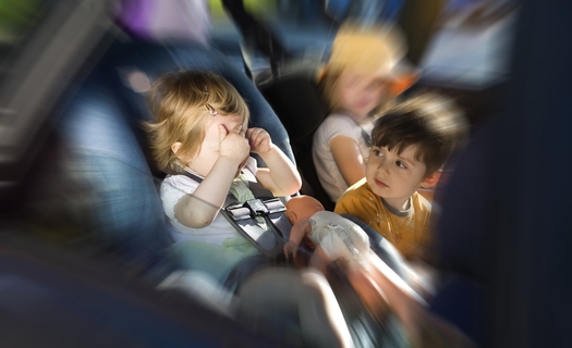 baby crying in an infant car seat