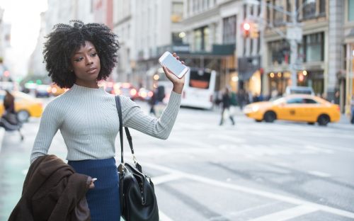 woman hailing an uber in Columbia, SC