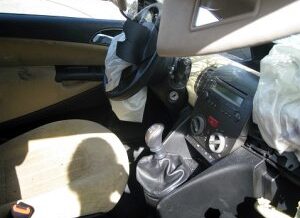 the inside of a car after the airbags have deployed