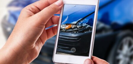 Taking pictures after a car accident.