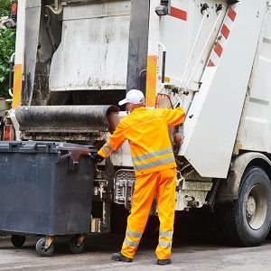 A Sanitation worker collecting garbages