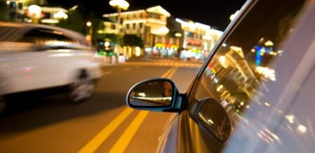 car speeding on the road