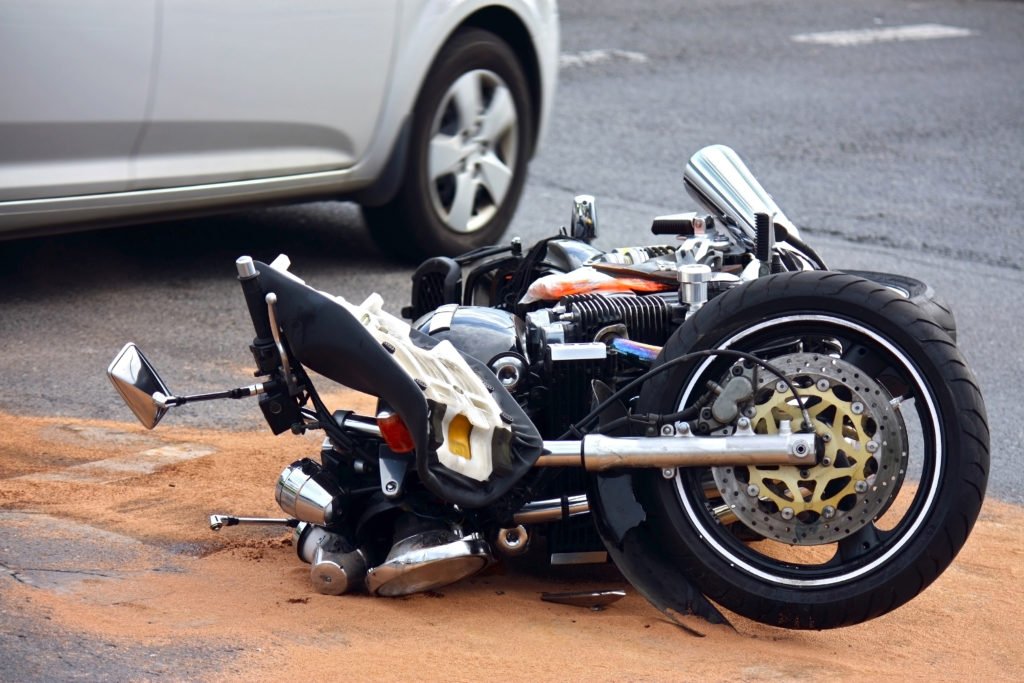 Motorcycle fallen over after a motorcycle accident