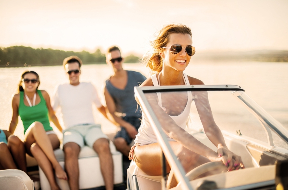 people on boat in lake