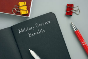 Legal concept about Military Service Benefits with inscription on the piece of paper.