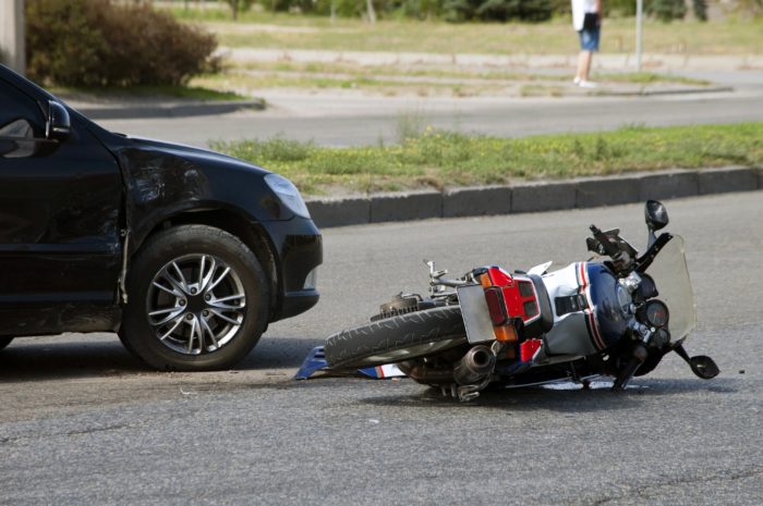 Motorcycle on its side after being in an accident