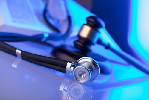medical stethoscope and a gavel