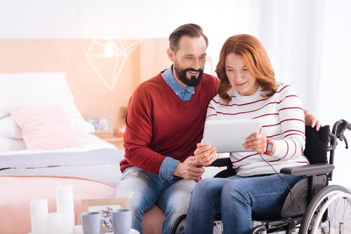 couple reading a piece of paper