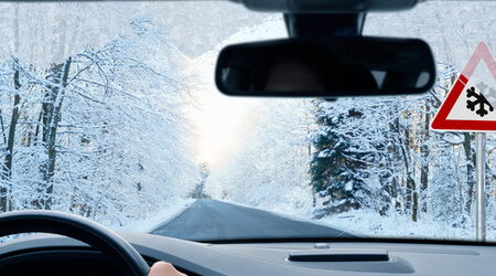 holiday travel on snowy road