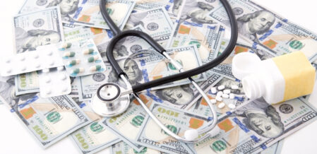 medicine poured out on top of money