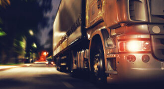 big truck travelling at night