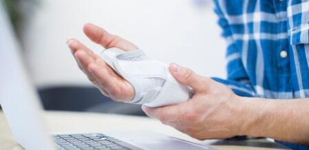 a wrist wrapped in a brace