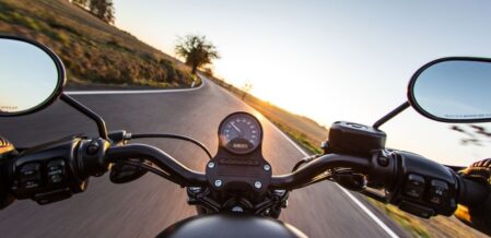 a motorcycle driving on an open road