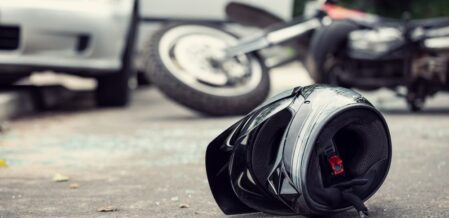 a motorcycle helmet on the ground after a crash