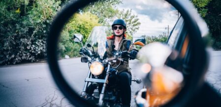 a motorcycle in the side mirror