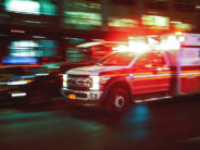 Motion blur ambulance attending pedestrian injury in Clemson, SC