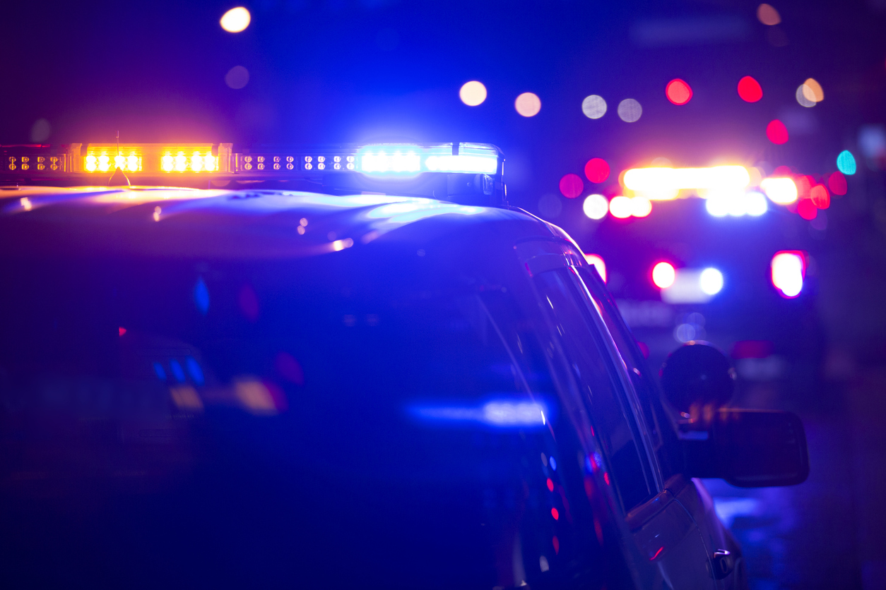 Police cruiser lights at the scene of a fatal accident involving a pedestrian in Charleston, SC