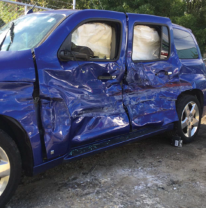 Blue SUV after being t-boned by tractor trailer in Clover, SC