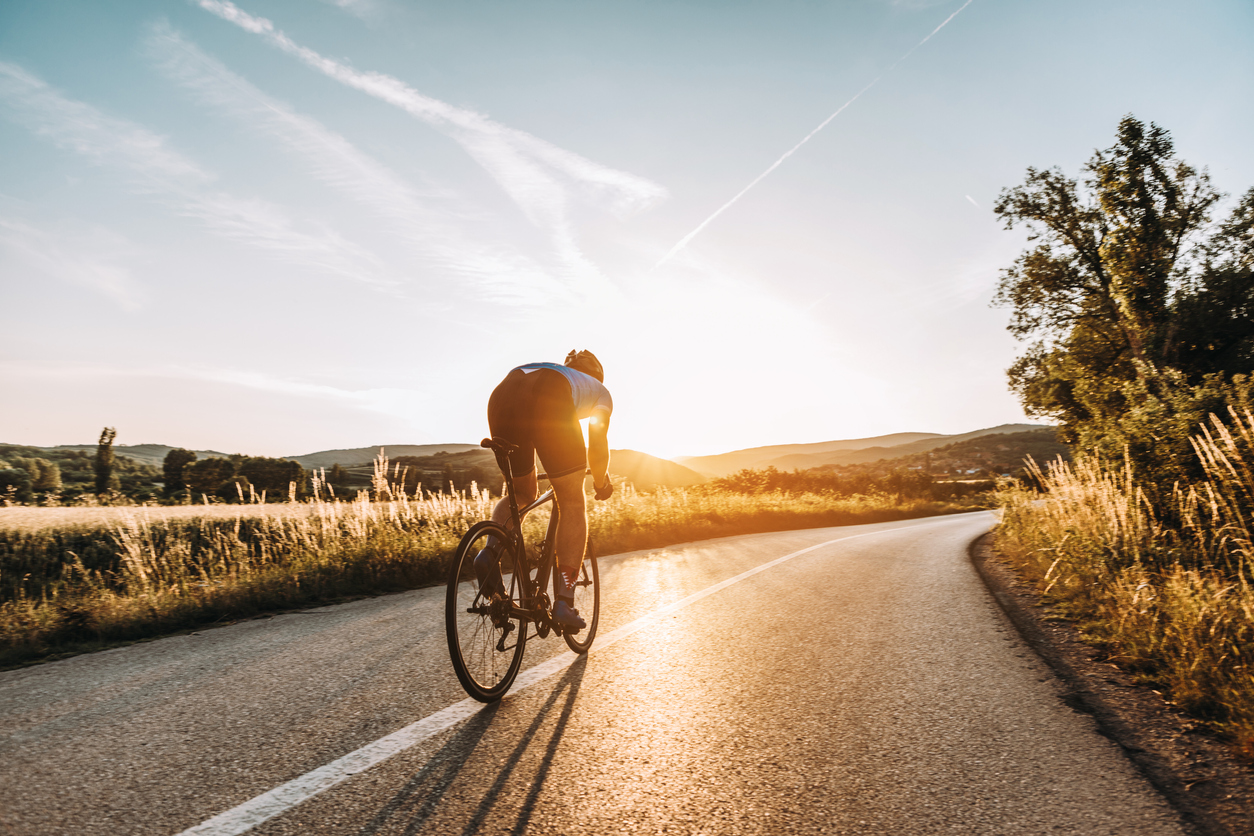 Professional road cyclist On a Training Ride in Charleston South Carolina as the sun comes up