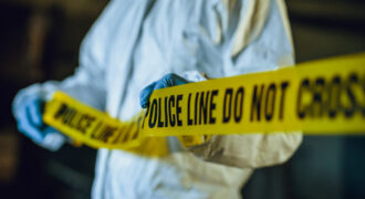 Police crime scene tap that says do not cross