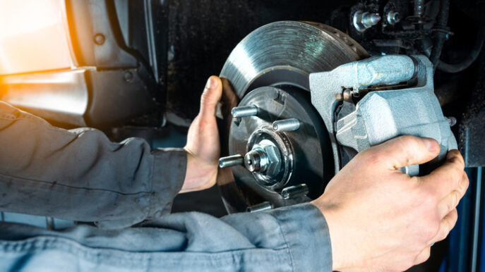Checking the brake discs of a modern car. Vehicle braking system.