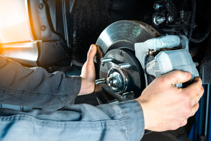 Checking the brake discs of a modern car. Vehicle braking system.