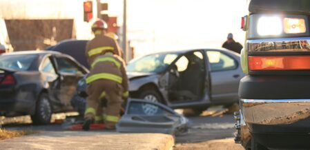 Car crash and firemen are helping
