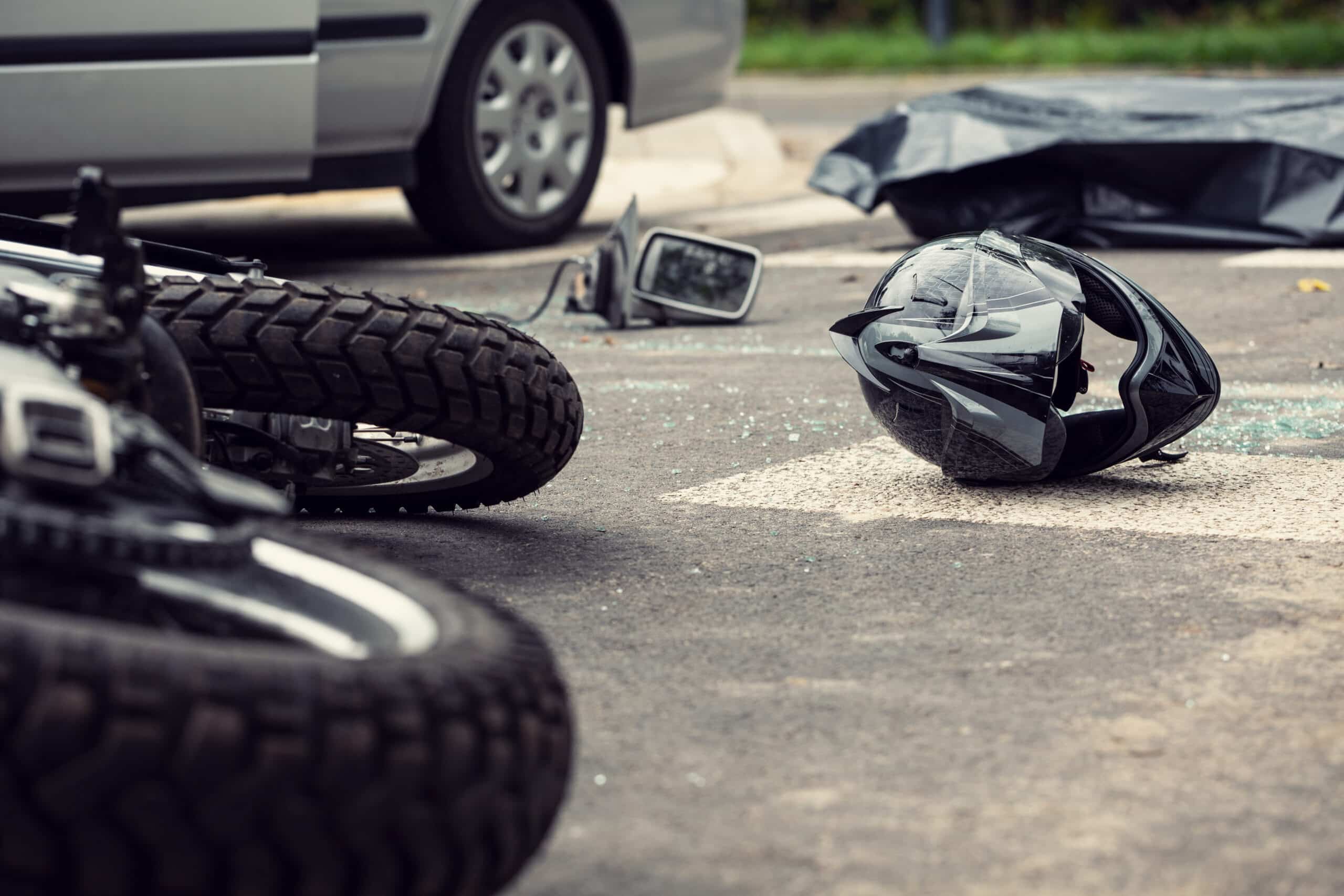 motorcycle helmet on the road after a car crash