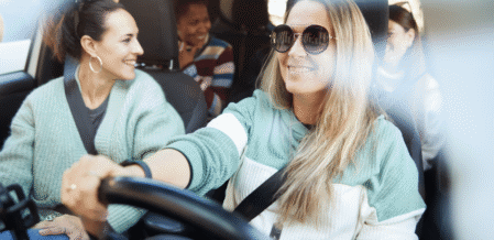 Image of a group of friends in a car