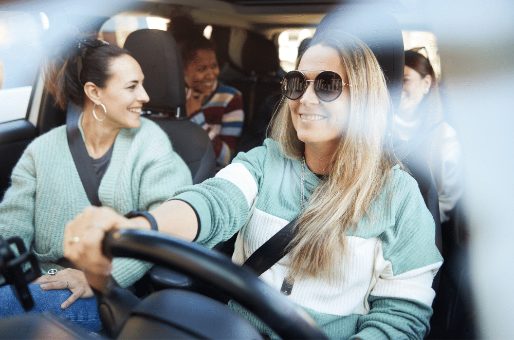 Image of a group of friends in a car