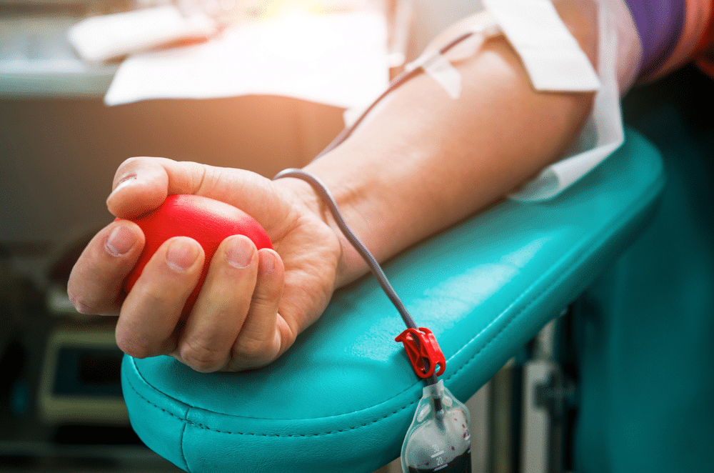 Image of someone's arm as they donate blood