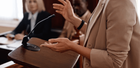 Image of a woman testifying in court
