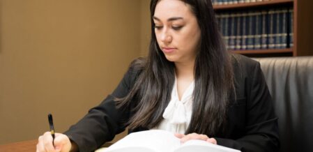 Sophie Dieckhause taking notes on a case