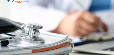 Image of a doctor working on paperwork