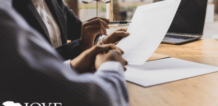 Image of lawyers reviewing paperwork