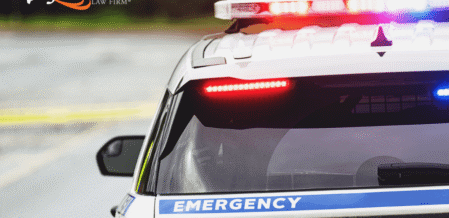 Image of a police car with its sirens and lights on