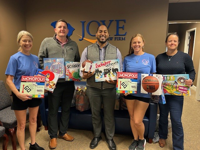 Joye Law Firm Injury Lawyers Myrtle Beach Donates Games for Foster Kids’ Game Night with AB Compassion Project
