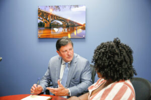 Attorney Ken Harrell discussing the case with Columbia case manager Eden Fields