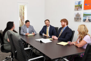 Greenville Joye Law Firm Injury Lawyers attorneys and case managers in the conference room