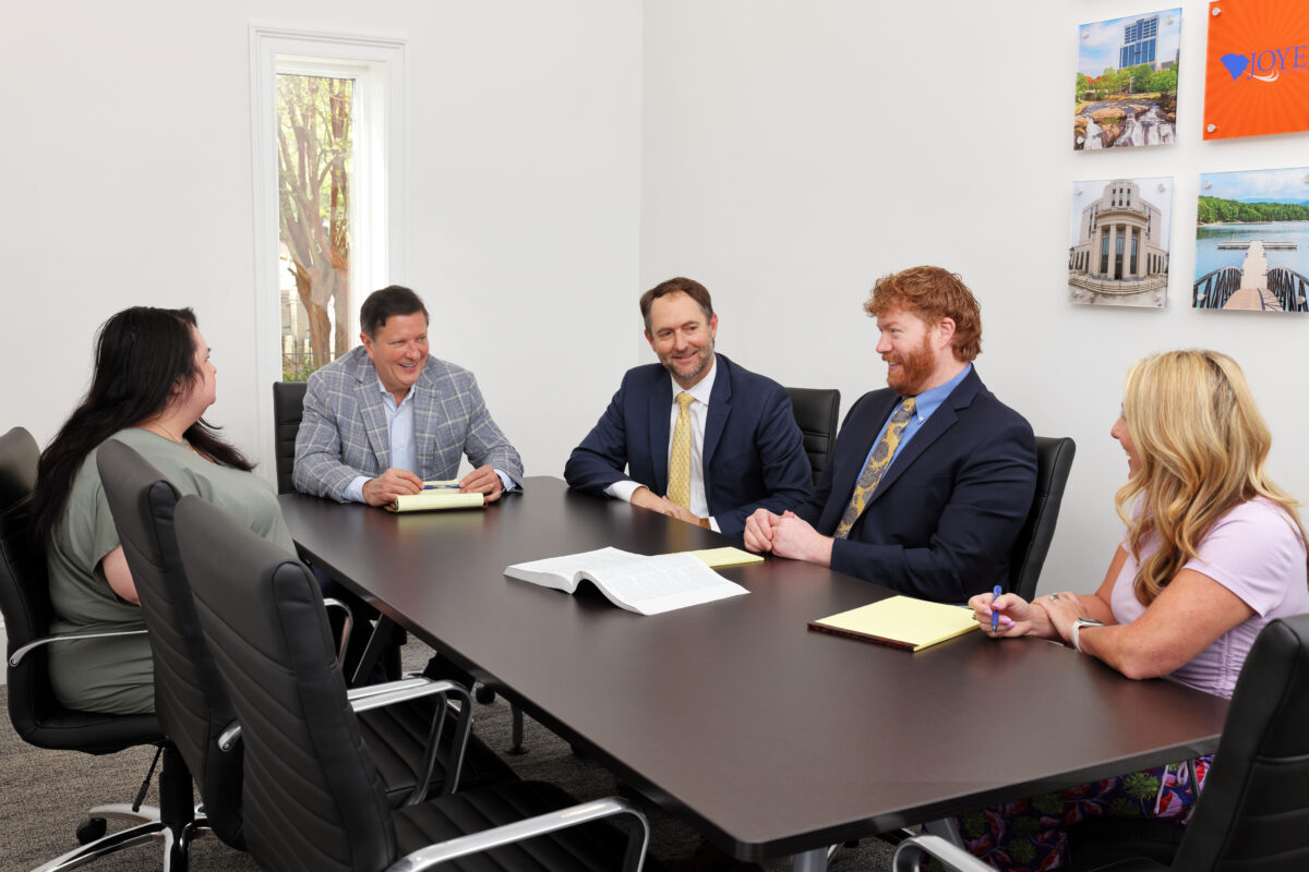 Greenville Joye Law Firm Injury Lawyers attorneys and case managers in the conference room