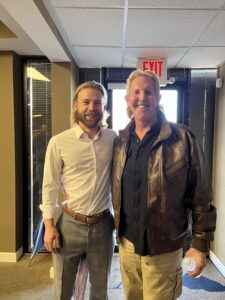 Attorney John Aylor of Joye Law firm Injury Lawyers North Charleston office with a client