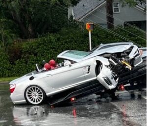 A photo of a vehicle getting towed after a car accident