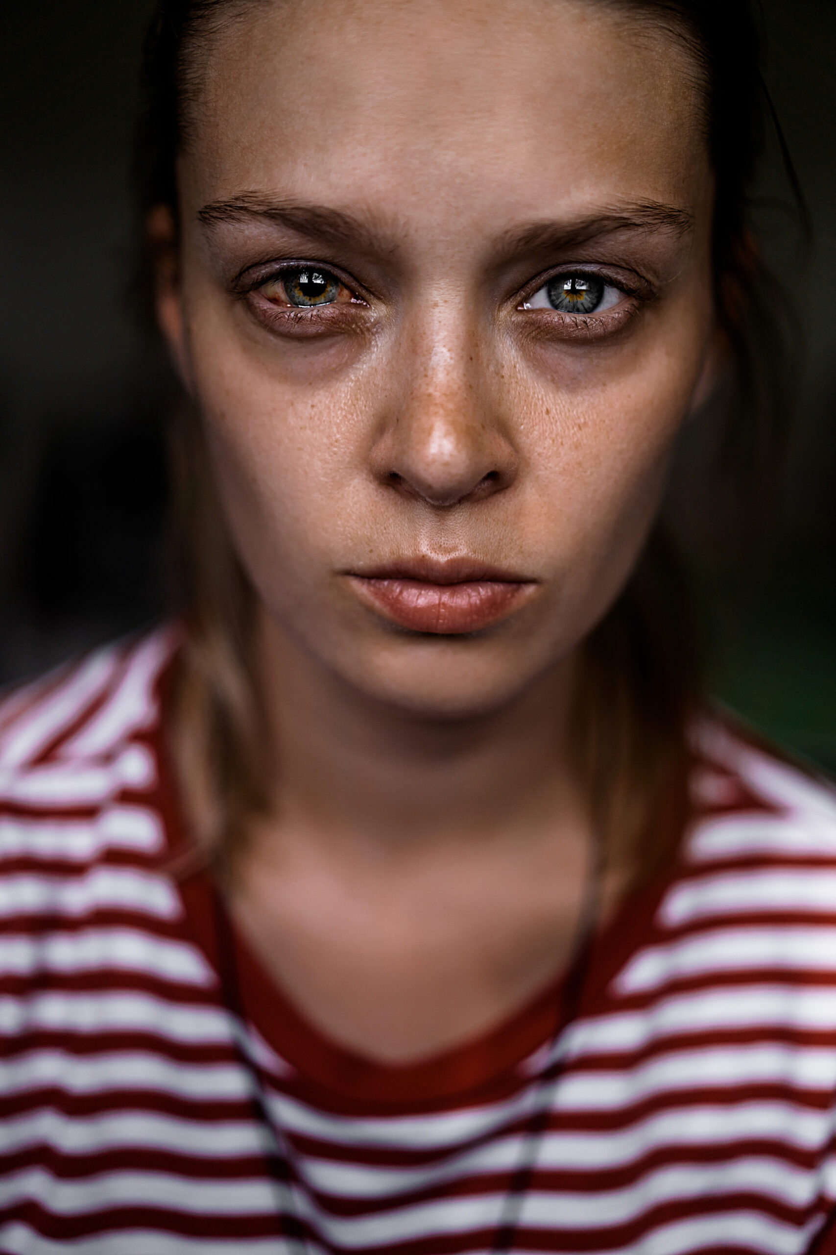 Emotional portrait of abused, crying, beautiful, young, Caucasian woman in underwear - violence concept